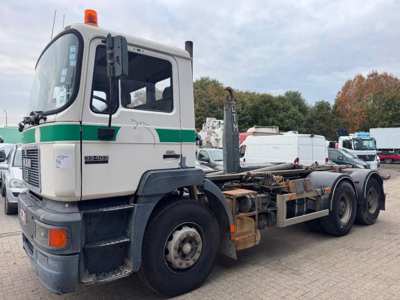 Abrollcontainer des Typs MAN 33.403 **BELGIAN TRUCK-FULL STEEL-MANUAL PUMP**, Gebrauchtmaschine in Kessel (Bild 1)