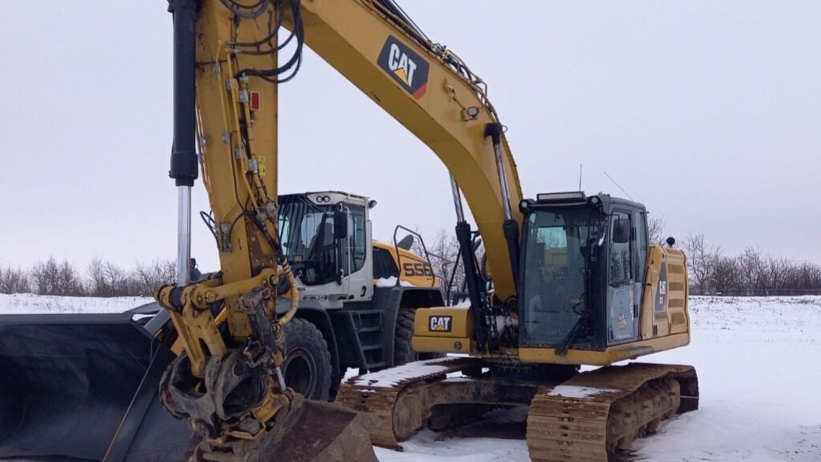 Bagger za tip Caterpillar 323, Gebrauchtmaschine u Rødovre (Slika 1)