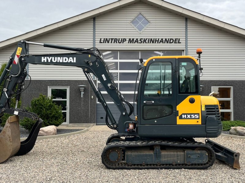 Bagger des Typs Hyundai HX55 Med Hydrema skifte og centralsmørring og grab-klo på. Udlejes, også med forkøbsret., Gebrauchtmaschine in Lintrup (Bild 1)