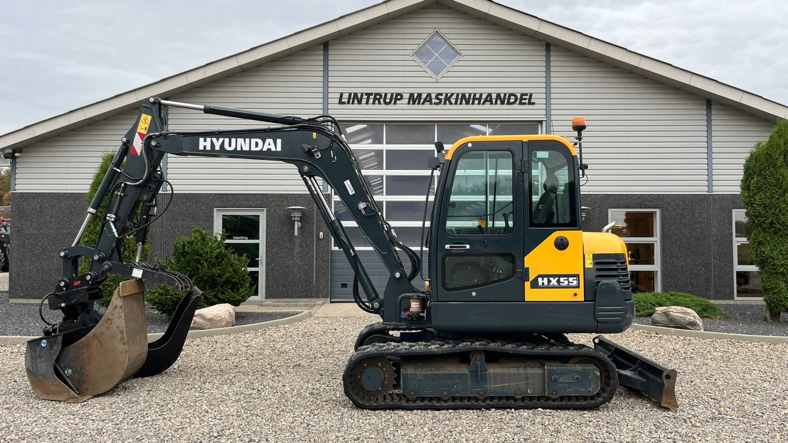 Bagger za tip Hyundai HX55 Med Hydrema skifte og centralsmørring og grab-klo på. Udlejes, også med forkøbsret., Gebrauchtmaschine u Lintrup (Slika 1)