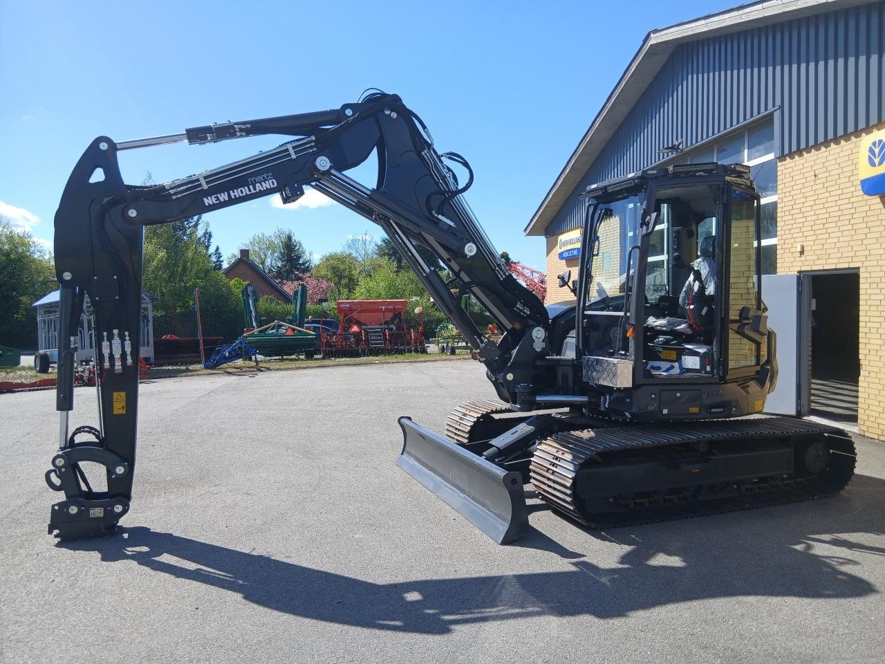 Bagger typu New Holland E100D 2PB-AG, Gebrauchtmaschine v Maribo (Obrázek 1)