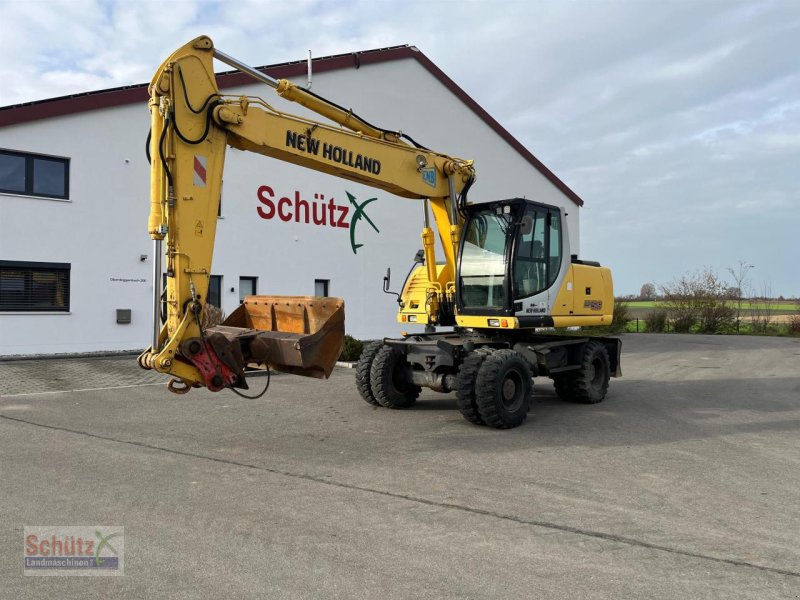 Bagger des Typs New Holland MH 5.6 inkl. Grabenlöffel, Tieflöffel, Gebrauchtmaschine in Schierling (Bild 1)