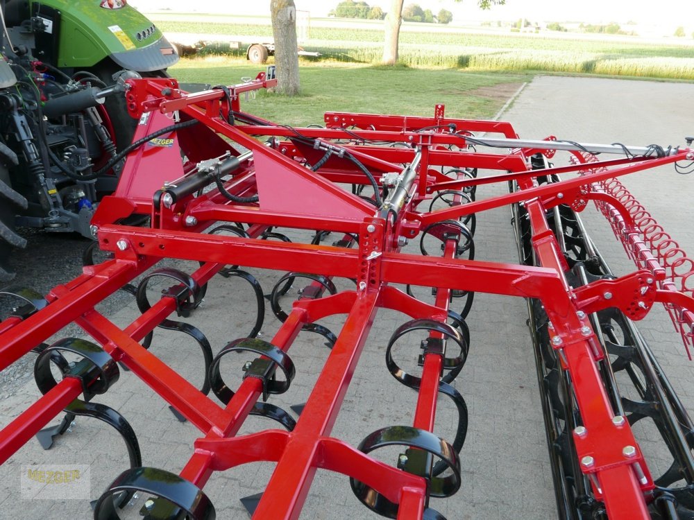 Grubber типа POM Meteor II Leichtgrubber 7 m, Flachgrubber, Federzinkengrubber, Neumaschine в Ditzingen (Фотография 4)