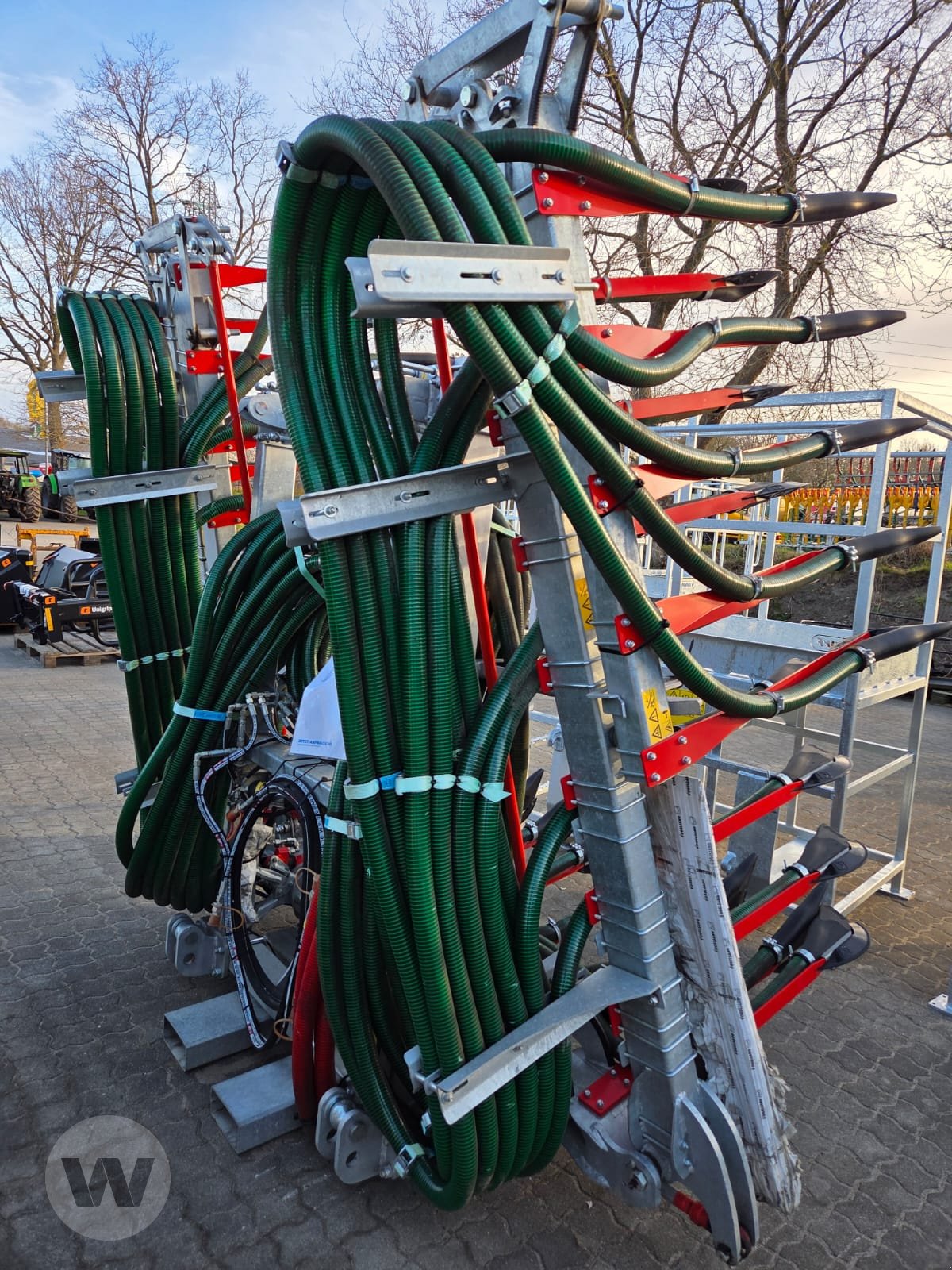 Gülleverteiltechnik of the type Vogelsang UNISPREAD 9 M, Neumaschine in Börm (Picture 1)