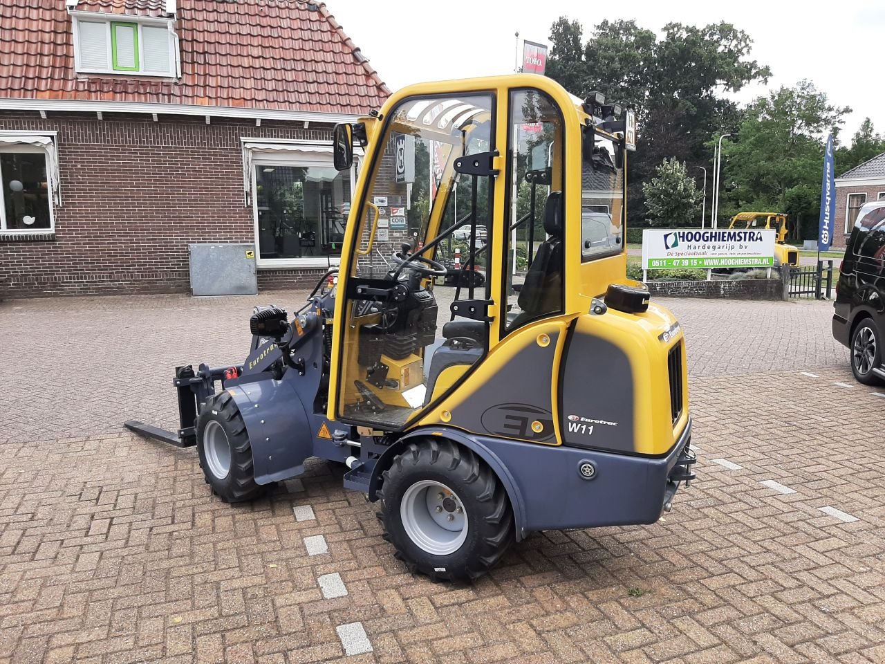 Knickgelenkte Baggerlader van het type Eurotrac W11-IC, Gebrauchtmaschine in Hardegarijp (Foto 4)