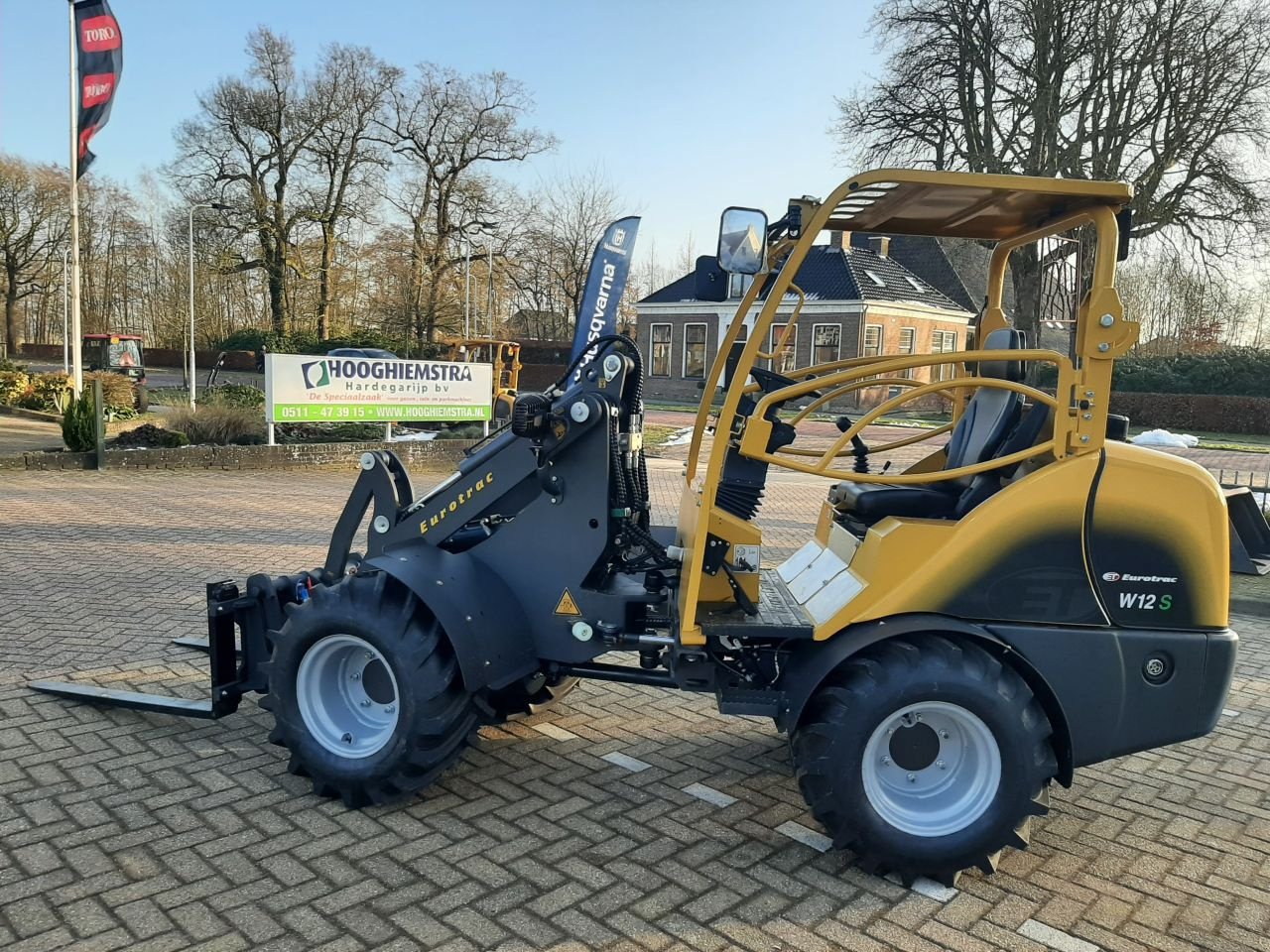 Knickgelenkte Baggerlader van het type Eurotrac W12 MS, Neumaschine in Hardegarijp (Foto 5)