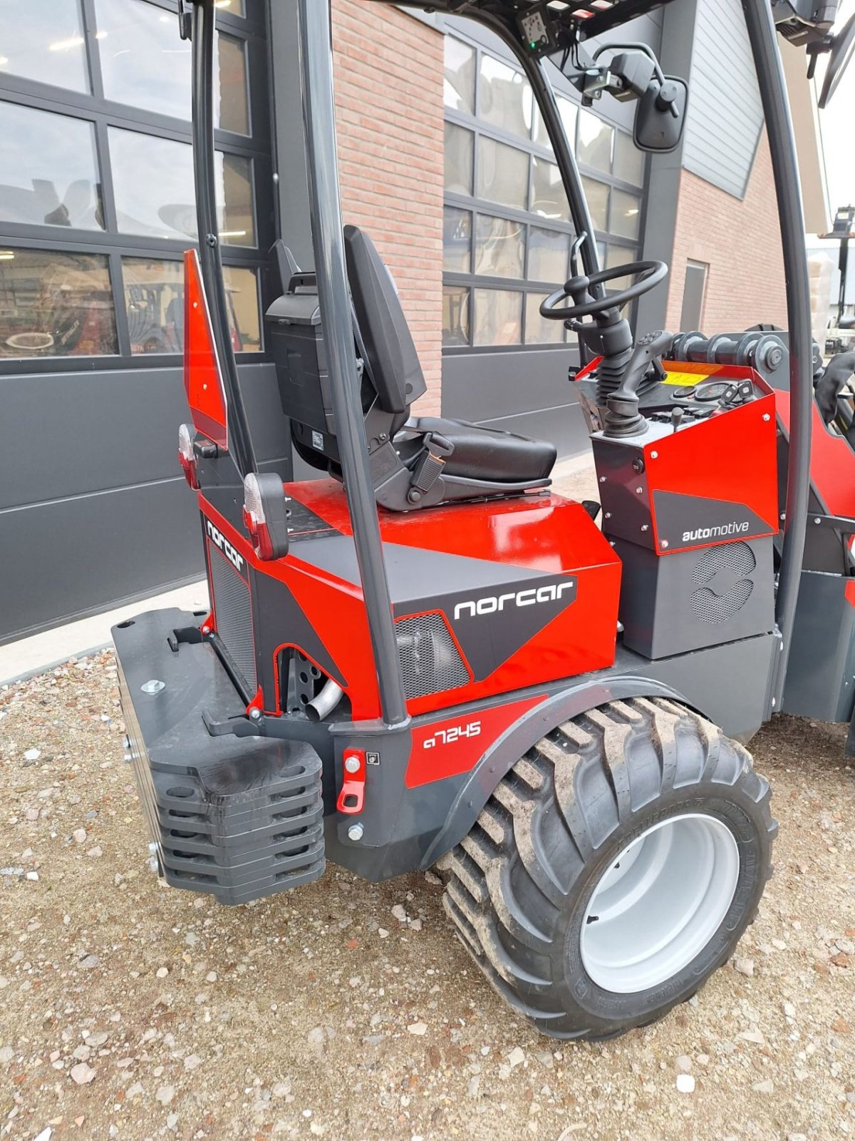 Knickgelenkte Baggerlader des Typs Norcar a7245, Neumaschine in Barneveld (Bild 10)