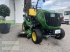 Kommunaltraktor типа John Deere 1026R offene Plattform mit Zwischenachs-Mähwerk, Neumaschine в München (Фотография 1)