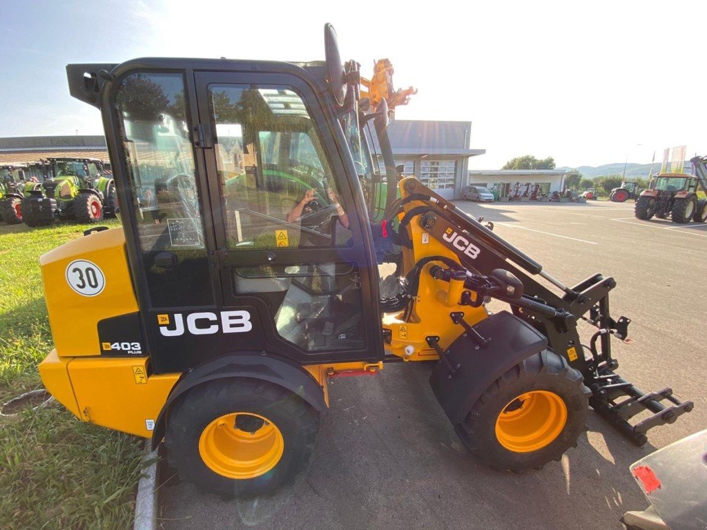 Kompaktlader des Typs JCB 403 Plus, Neumaschine in Domdidier (Bild 2)