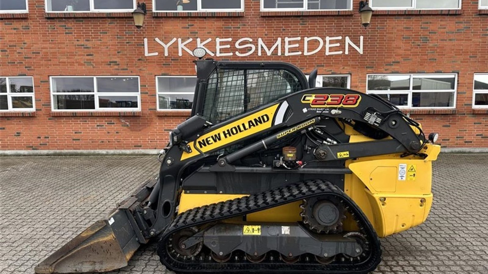 Kompaktlader of the type New Holland C238, Gebrauchtmaschine in Gjerlev J. (Picture 1)