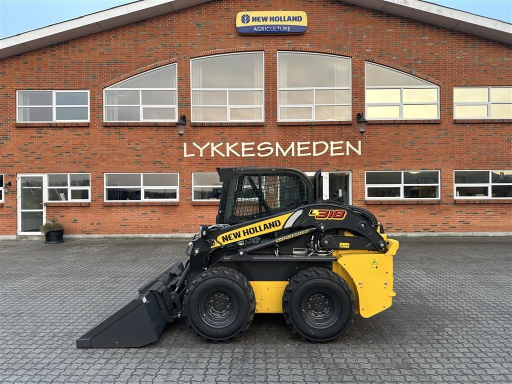 Kompaktlader of the type New Holland L318, Gebrauchtmaschine in Gjerlev J. (Picture 1)