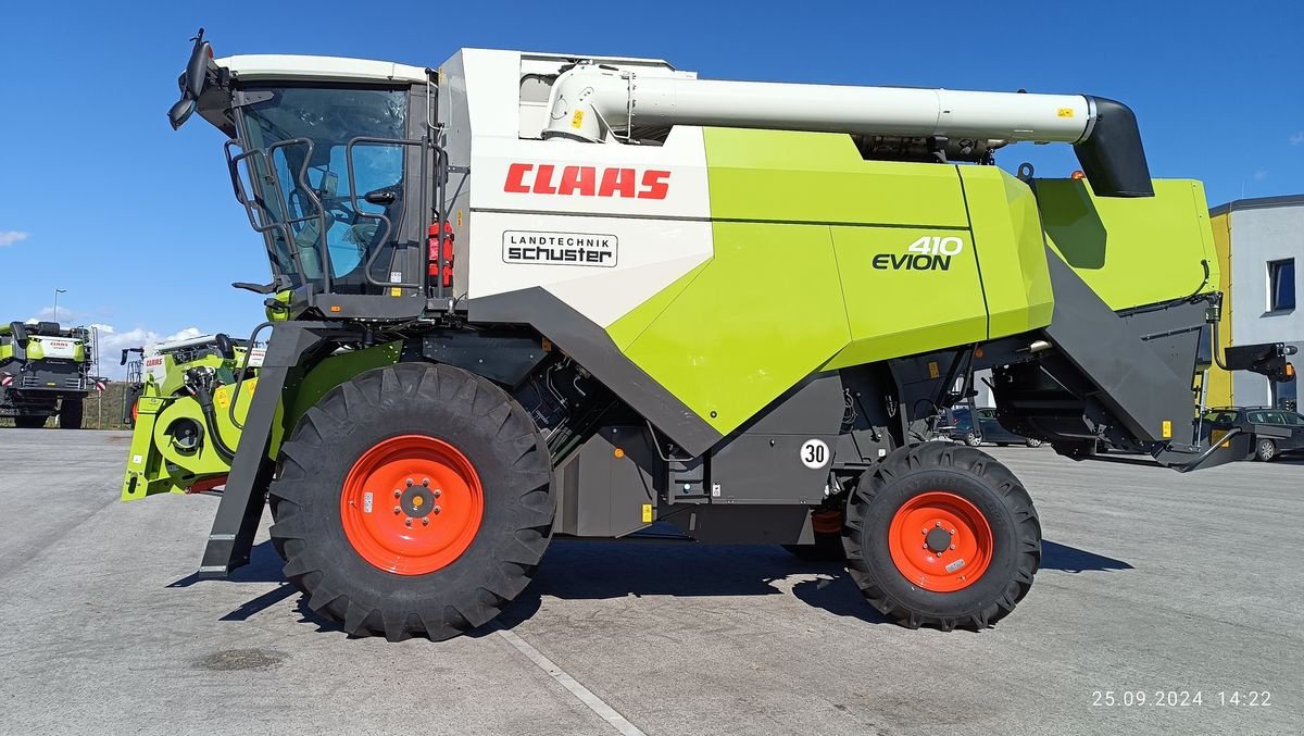 Mähdrescher of the type CLAAS Evion 410, Neumaschine in Grund (Picture 10)