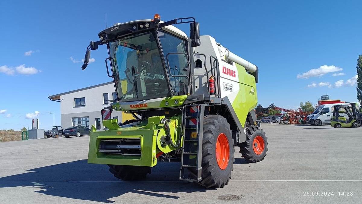 Mähdrescher of the type CLAAS Evion 410, Neumaschine in Grund (Picture 14)