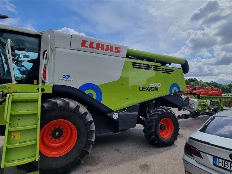 Mähdrescher of the type CLAAS LEXION 670 Incl. Vario V770. 4WD. Vi giver 100 timers reklamationsret i DK!!! CEMOS Cruise Pilot. 3D. XL Snegl. Profi Cam. S7 Terminal. Quantimeter., Gebrauchtmaschine in Kolding (Picture 1)