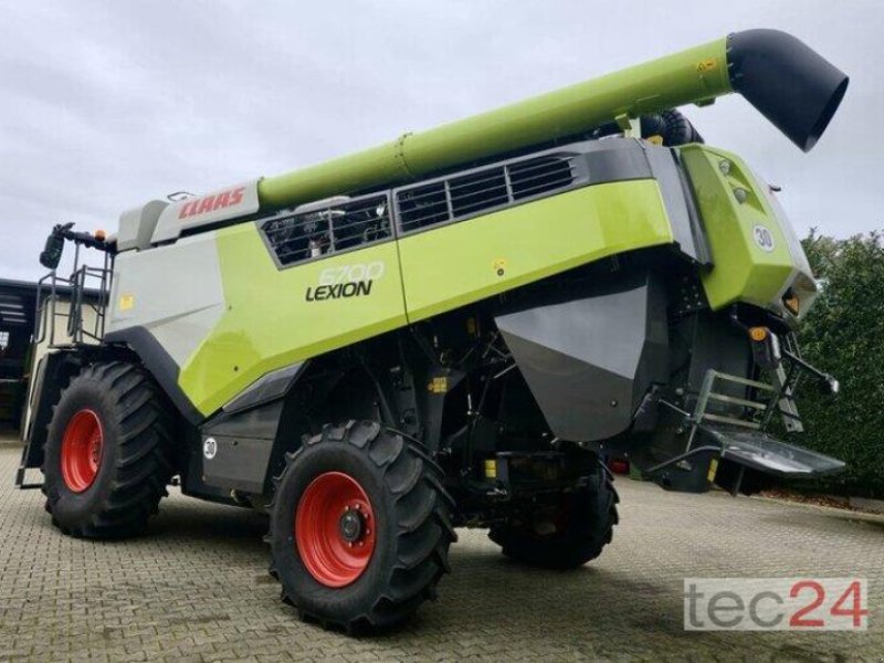 Mähdrescher tipa CLAAS Lexion 6700 mit Schneidwerk, Vorführmaschine u Östringen