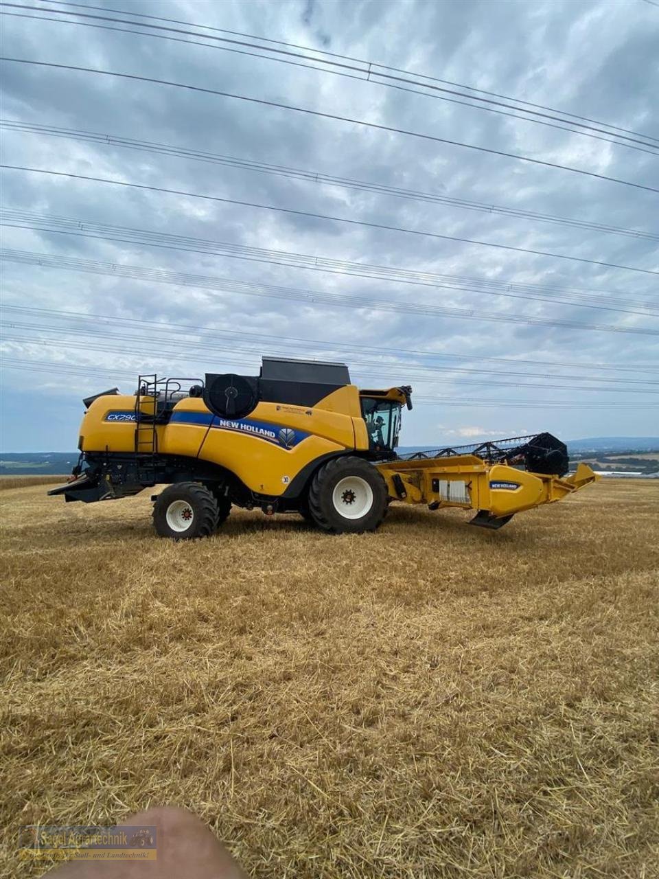 Mähdrescher of the type New Holland CX7.90 ST5 ZED, Neumaschine in Rhaunen (Picture 1)