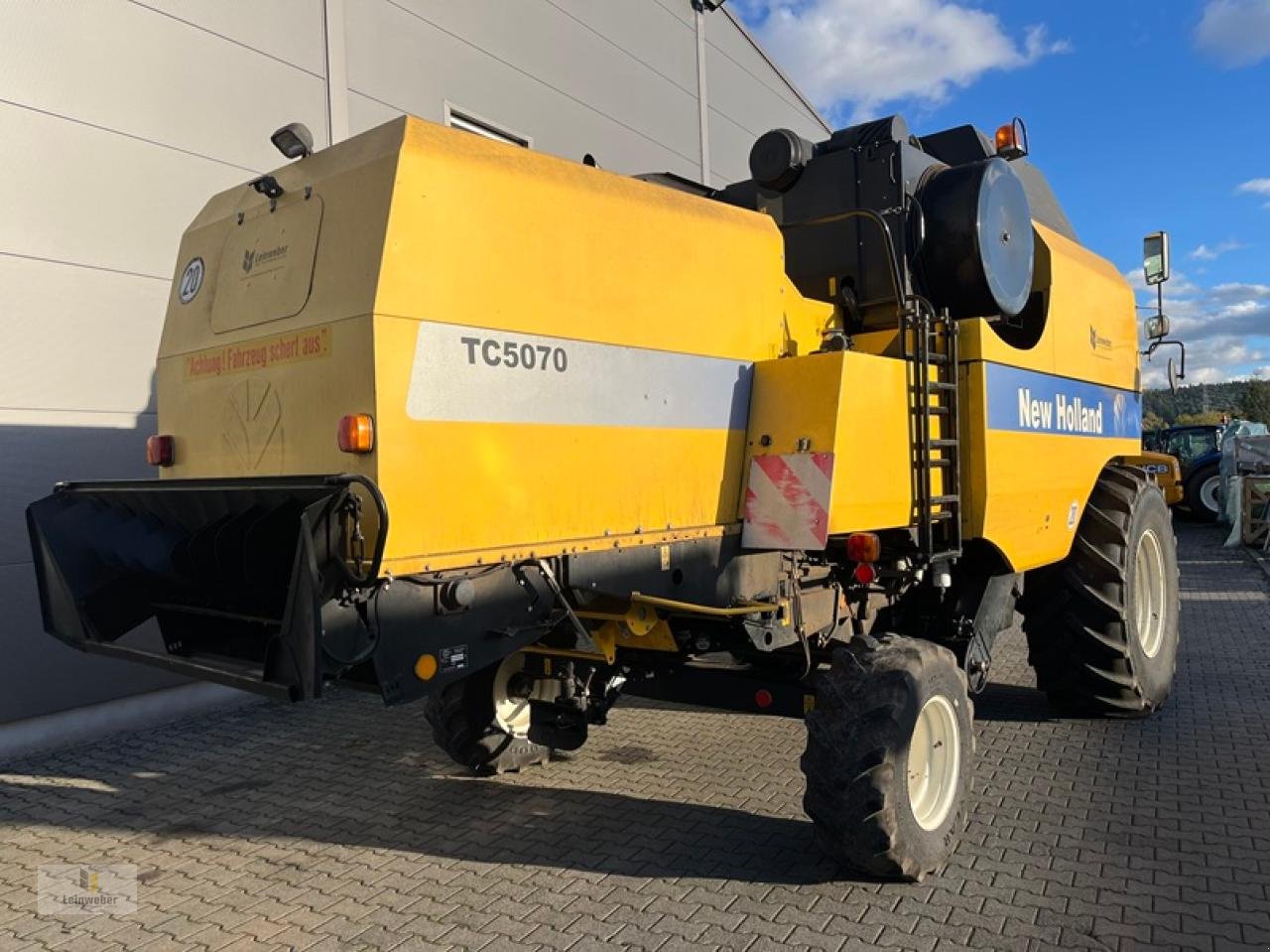 Mähdrescher van het type New Holland TC 5070, Gebrauchtmaschine in Neuhof - Dorfborn (Foto 3)