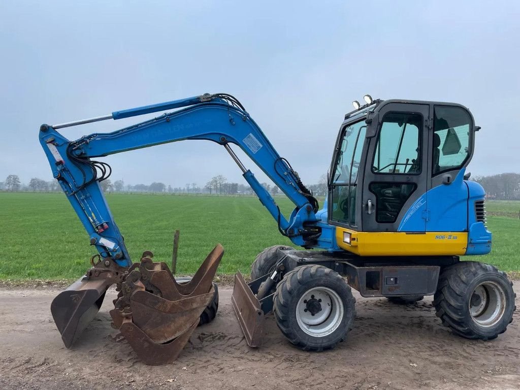 Minibagger tip Doosan DX55 WD Bandenkraan Graafmachine, Gebrauchtmaschine in Lunteren (Poză 1)