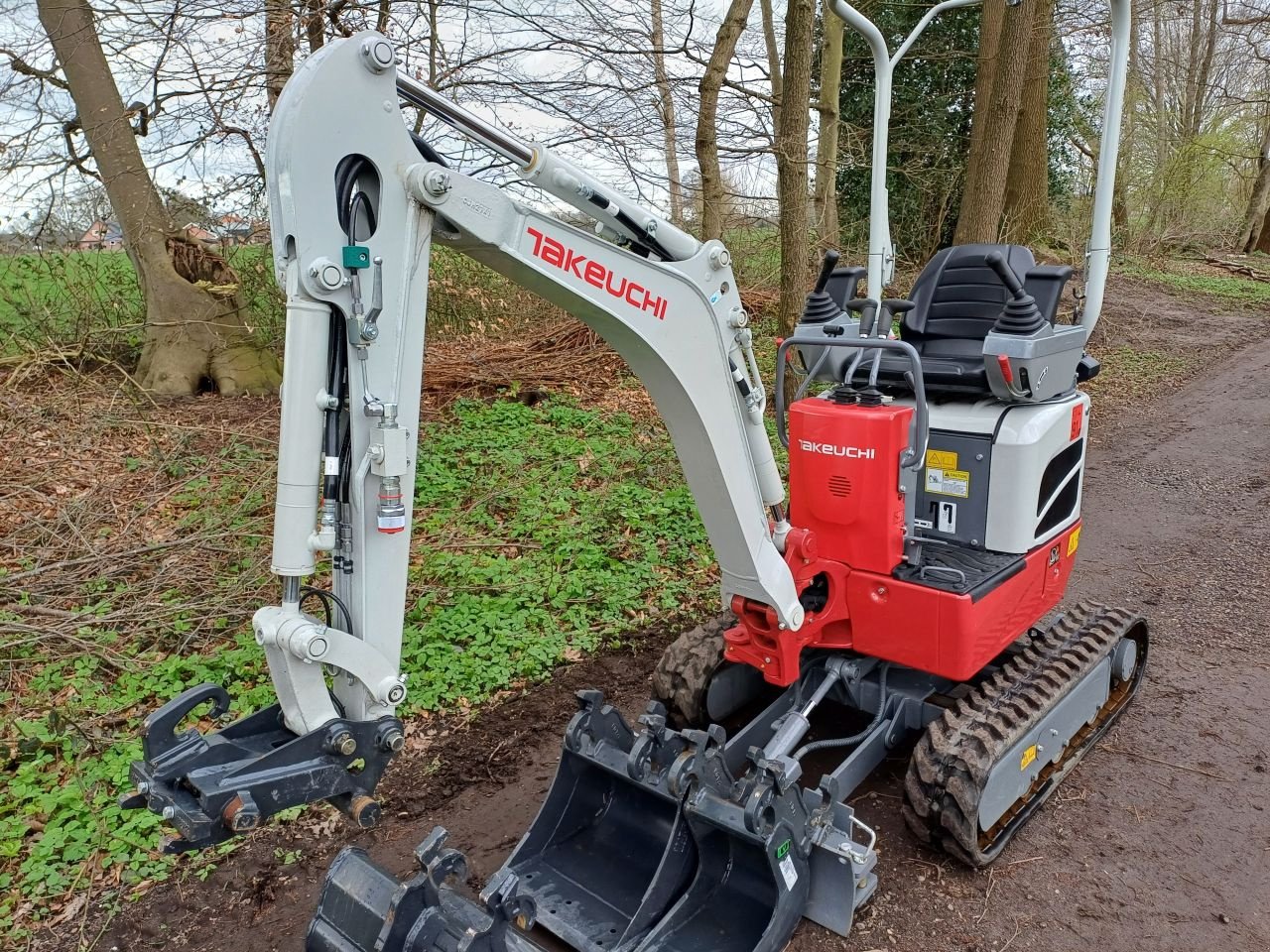 Minibagger des Typs Takeuchi TB210R TB210, Neumaschine in Terschuur (Bild 2)