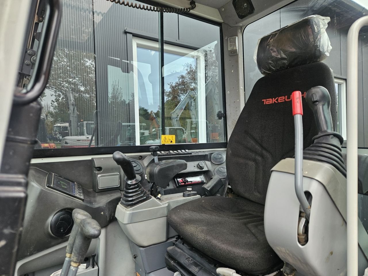 Minibagger van het type Takeuchi TB230, Gebrauchtmaschine in Haaksbergen (Foto 3)