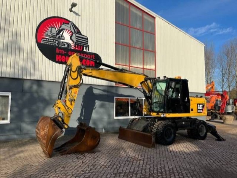 Mobilbagger del tipo Caterpillar M313D, new tires, blade/stamps, good, Gebrauchtmaschine In Uitgeest (Immagine 1)