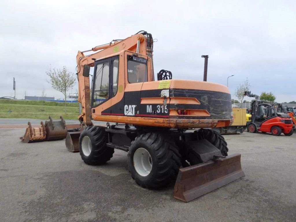 Mobilbagger des Typs Caterpillar M315, Gebrauchtmaschine in Zutphen (Bild 4)