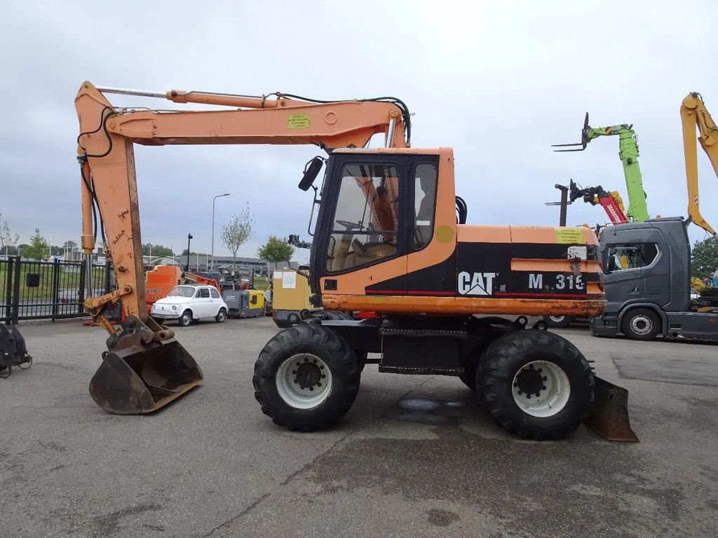Mobilbagger des Typs Caterpillar M315, Gebrauchtmaschine in Zutphen (Bild 7)