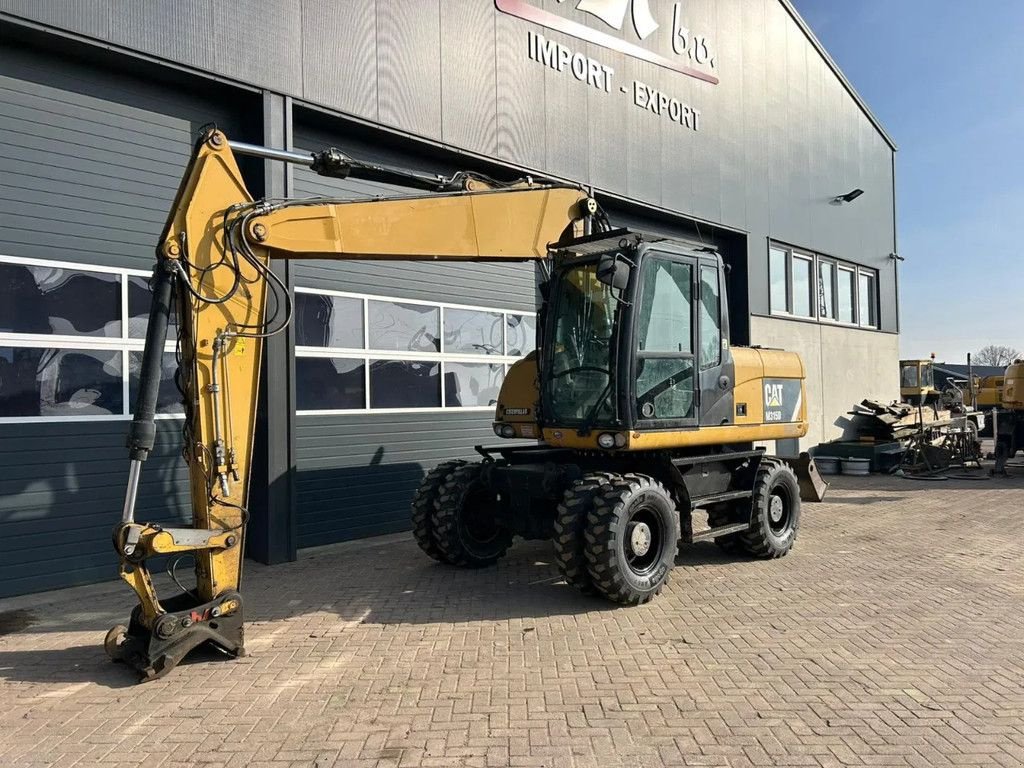 Mobilbagger za tip Caterpillar M315D, Gebrauchtmaschine u Barneveld (Slika 1)
