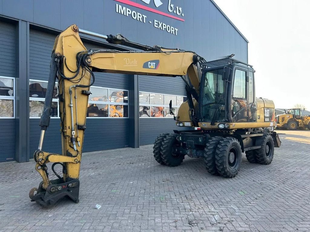 Mobilbagger of the type Caterpillar M315D, Gebrauchtmaschine in Barneveld (Picture 1)