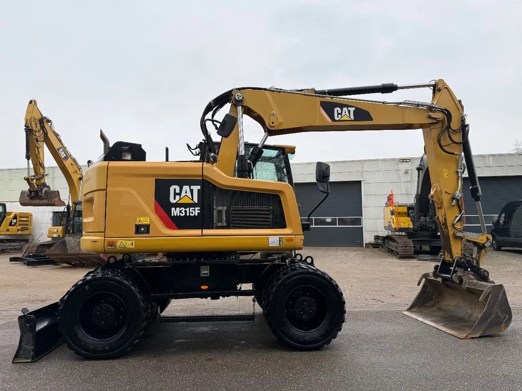 Mobilbagger типа Caterpillar M315F, Gebrauchtmaschine в Doetinchem (Фотография 5)
