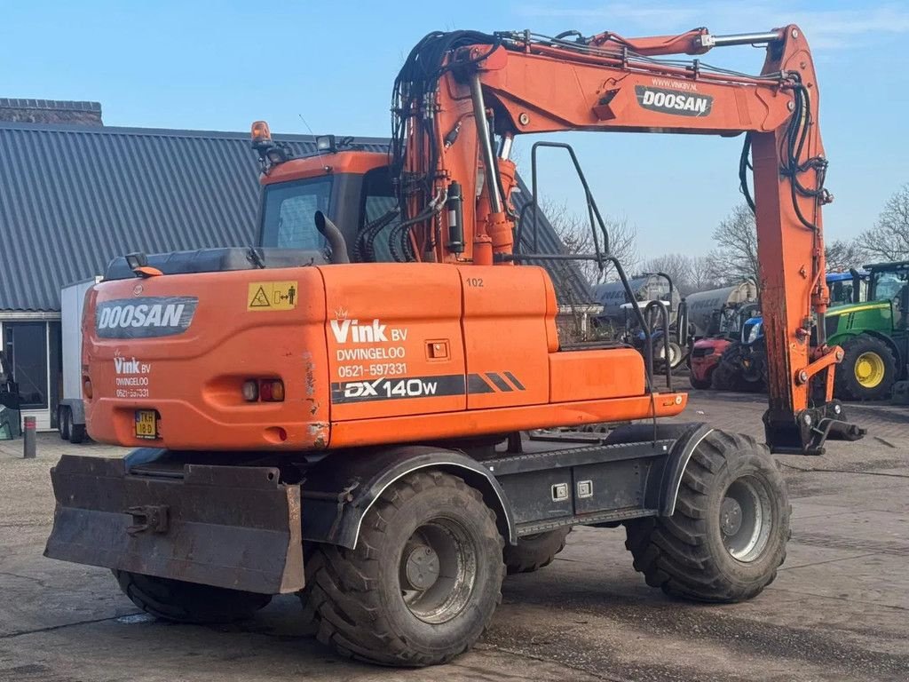 Mobilbagger of the type Doosan Dx 140 W, Gebrauchtmaschine in Ruinerwold (Picture 11)