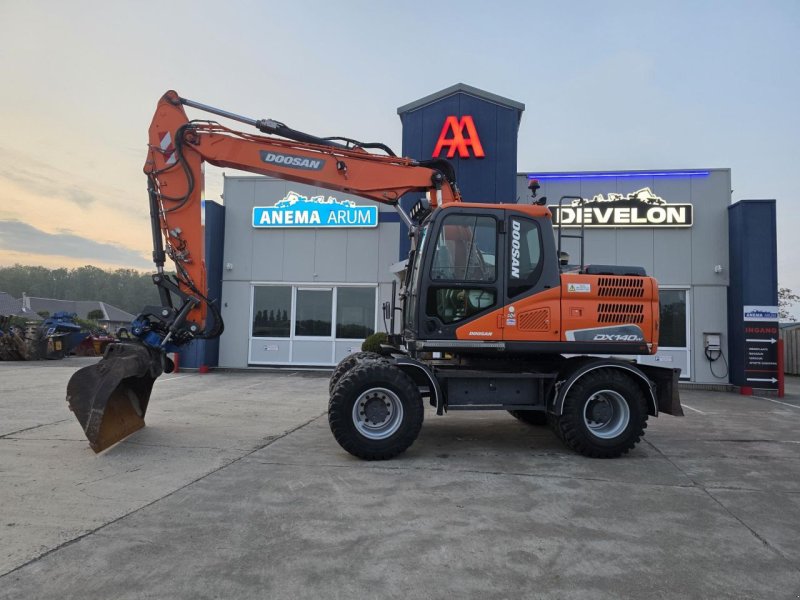 Mobilbagger of the type Doosan DX140W-5, Gebrauchtmaschine in Arum (Picture 1)