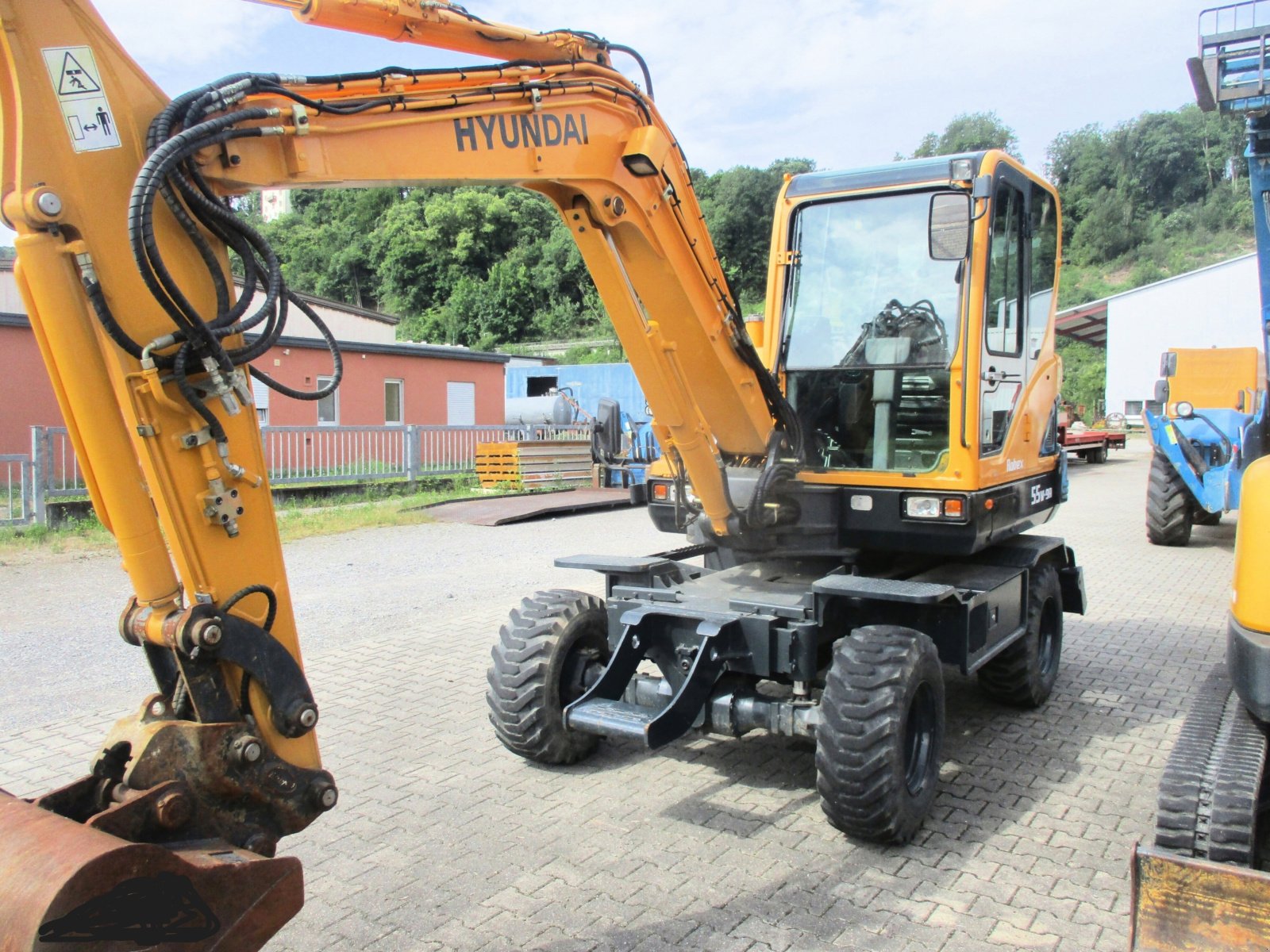 Mobilbagger des Typs Hyundai 55W-9, Gebrauchtmaschine in Obrigheim (Bild 1)