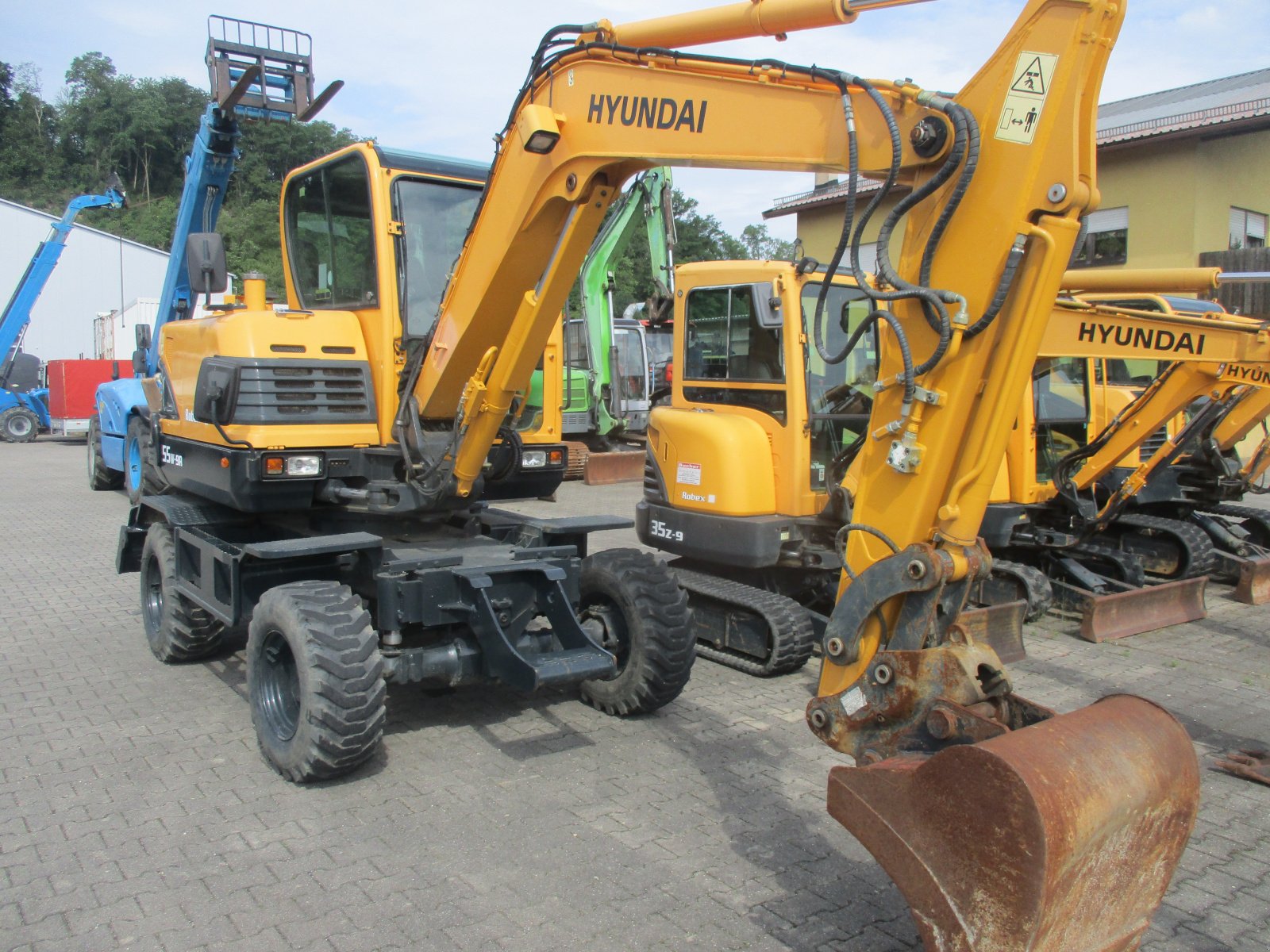 Mobilbagger des Typs Hyundai 55W-9, Gebrauchtmaschine in Obrigheim (Bild 2)