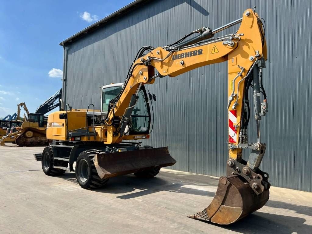 Mobilbagger des Typs Liebherr A311 Litronic, Gebrauchtmaschine in Venlo (Bild 3)