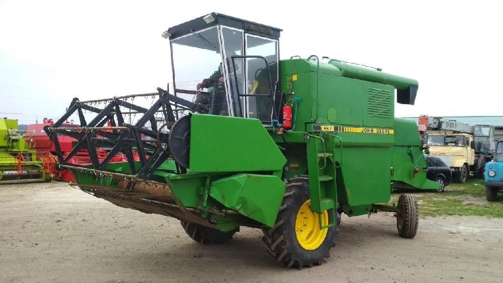 Oldtimer-Mähdrescher des Typs John Deere 1032, Neumaschine in Херсон (Bild 1)