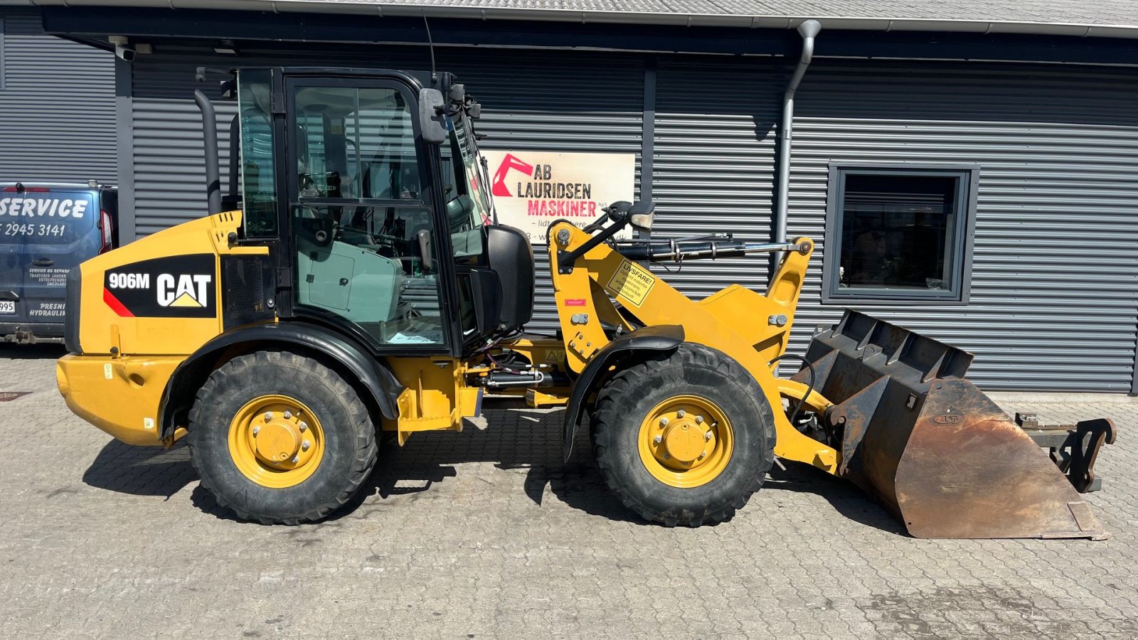 Radlader of the type CAT 906 M med skovl og gafler, Gebrauchtmaschine in Rønnede (Picture 1)