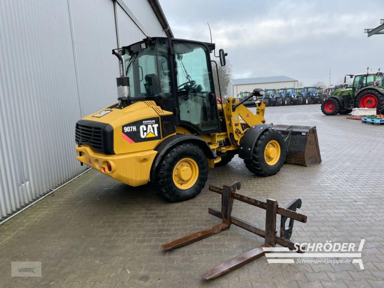 Radlader del tipo Caterpillar 907 H + SCHAUFEL + PALETTENGABEL, Gebrauchtmaschine en Wildeshausen (Imagen 5)