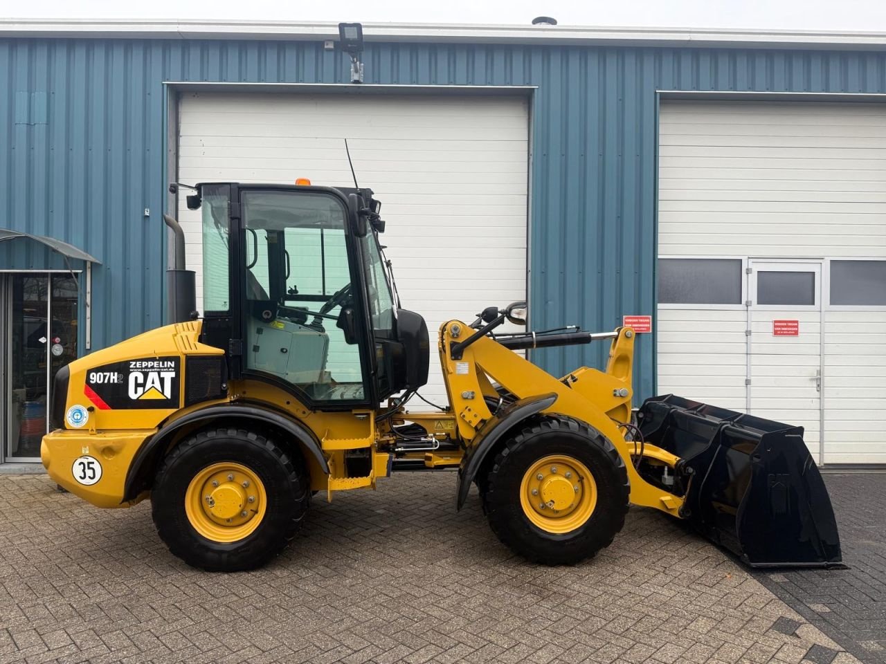 Radlader типа Caterpillar 907H, Gebrauchtmaschine в Oirschot (Фотография 4)