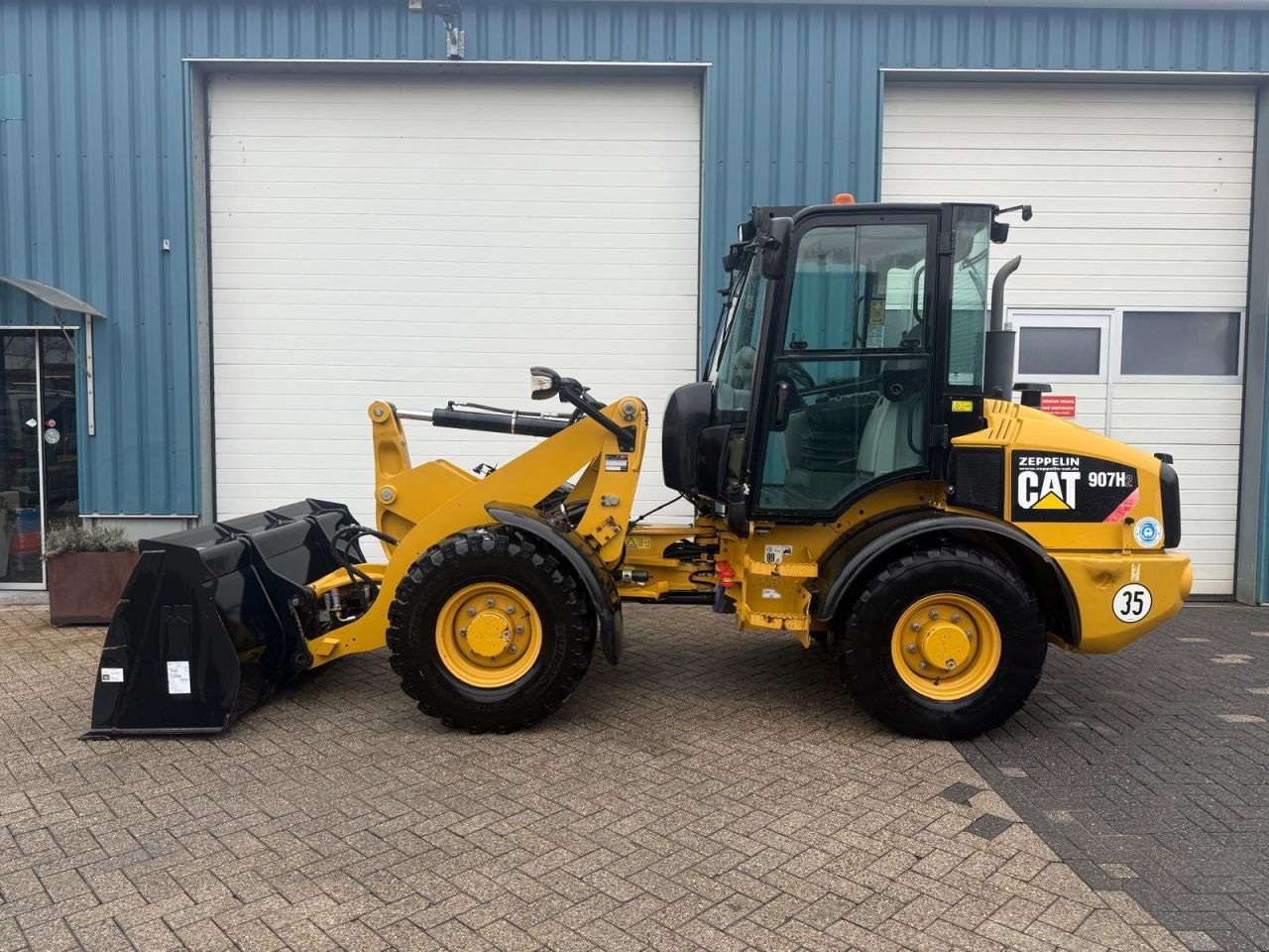 Radlader типа Caterpillar 907H, Gebrauchtmaschine в Oirschot (Фотография 3)