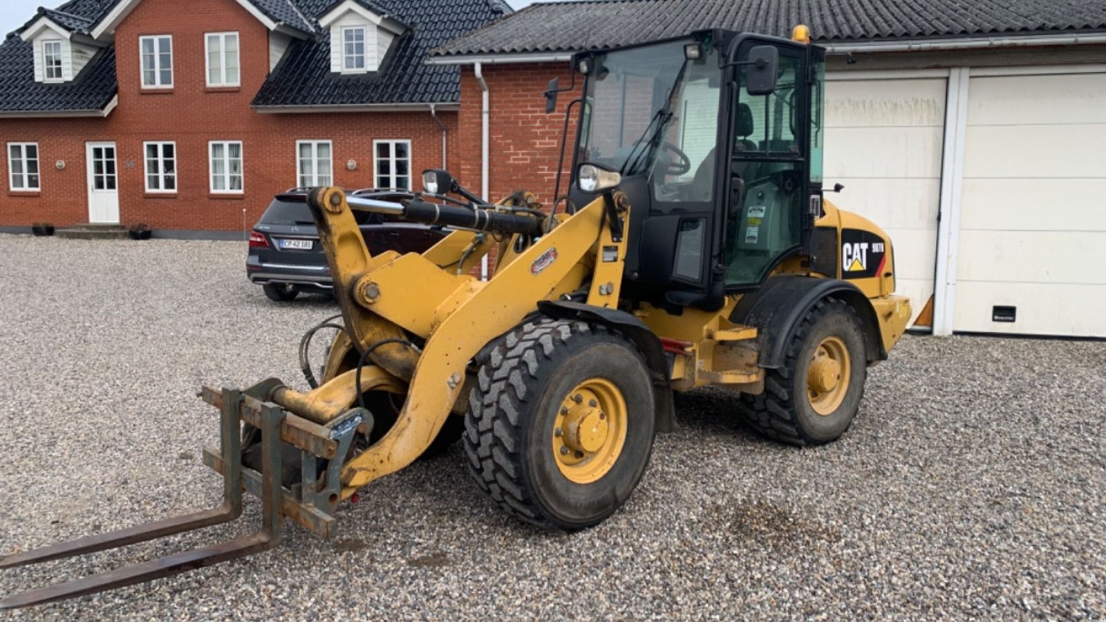 Radlader of the type Caterpillar 907H, Gebrauchtmaschine in Nørager (Picture 1)