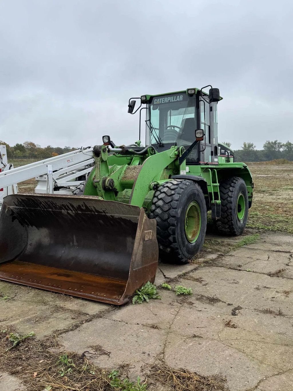 Radlader des Typs Caterpillar 928G, Gebrauchtmaschine in Oost West en Middelbeers (Bild 1)