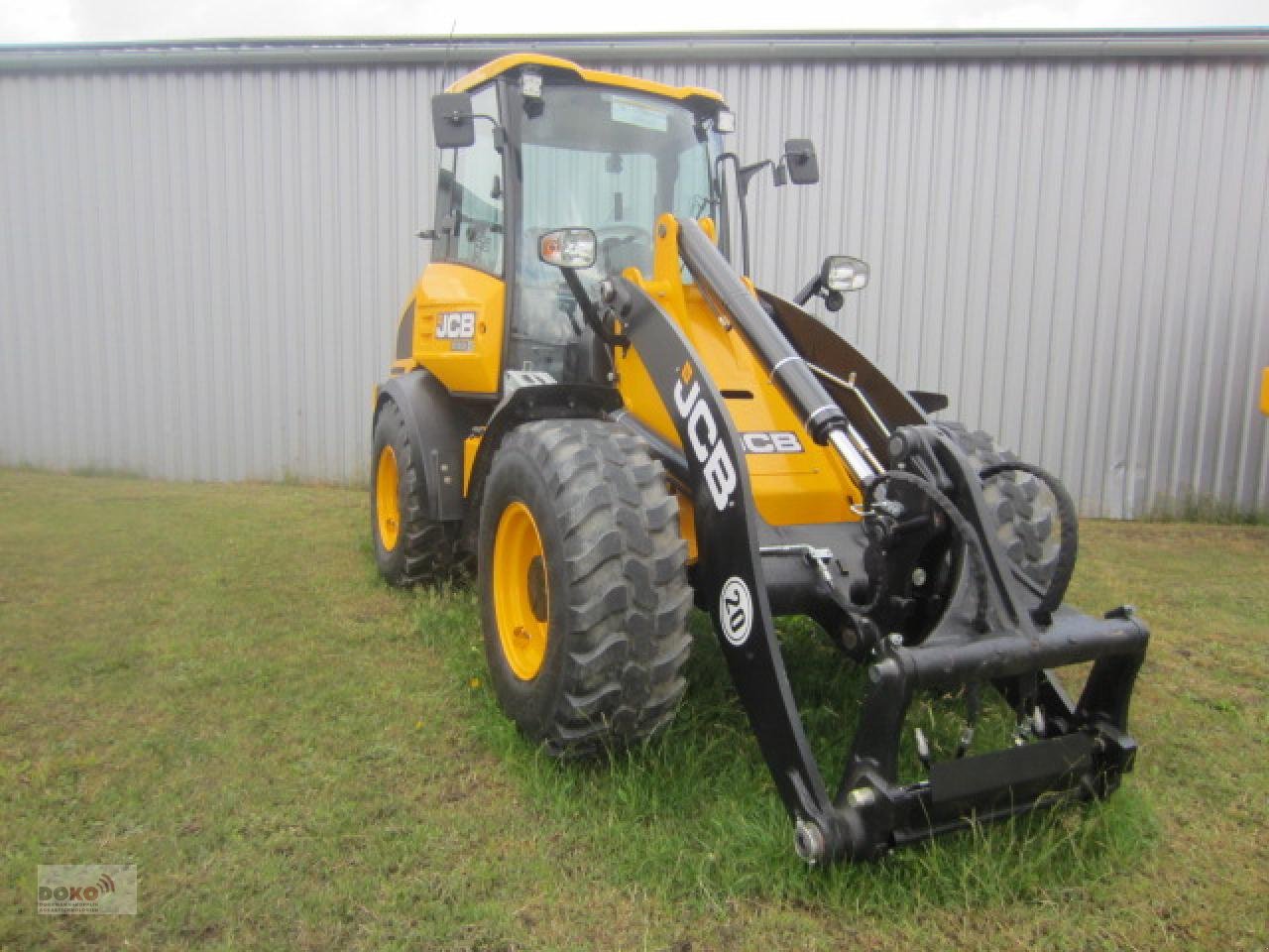 Radlader des Typs JCB 409 AGRI, Neumaschine in Schoenberg (Bild 2)