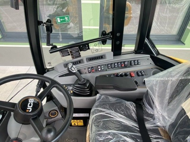 Radlader des Typs JCB 409 Mietmaschine, Mietmaschine in Hürm (Bild 14)