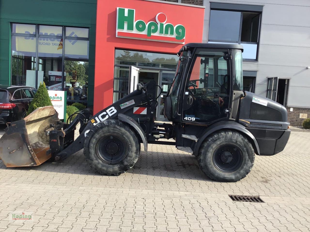 Radlader tip JCB 409, Gebrauchtmaschine in Bakum (Poză 1)