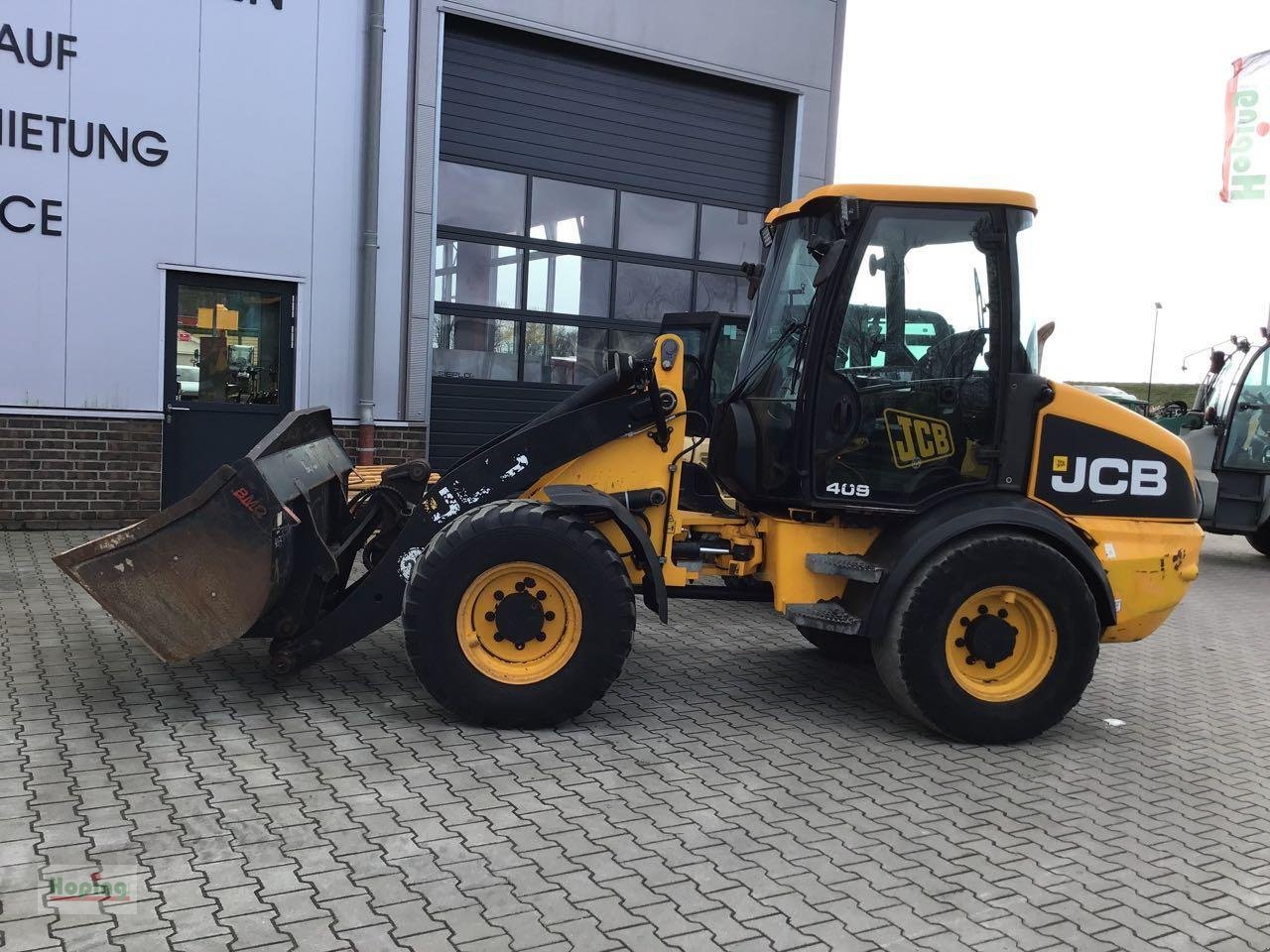 Radlader des Typs JCB 409, Gebrauchtmaschine in Bakum (Bild 1)