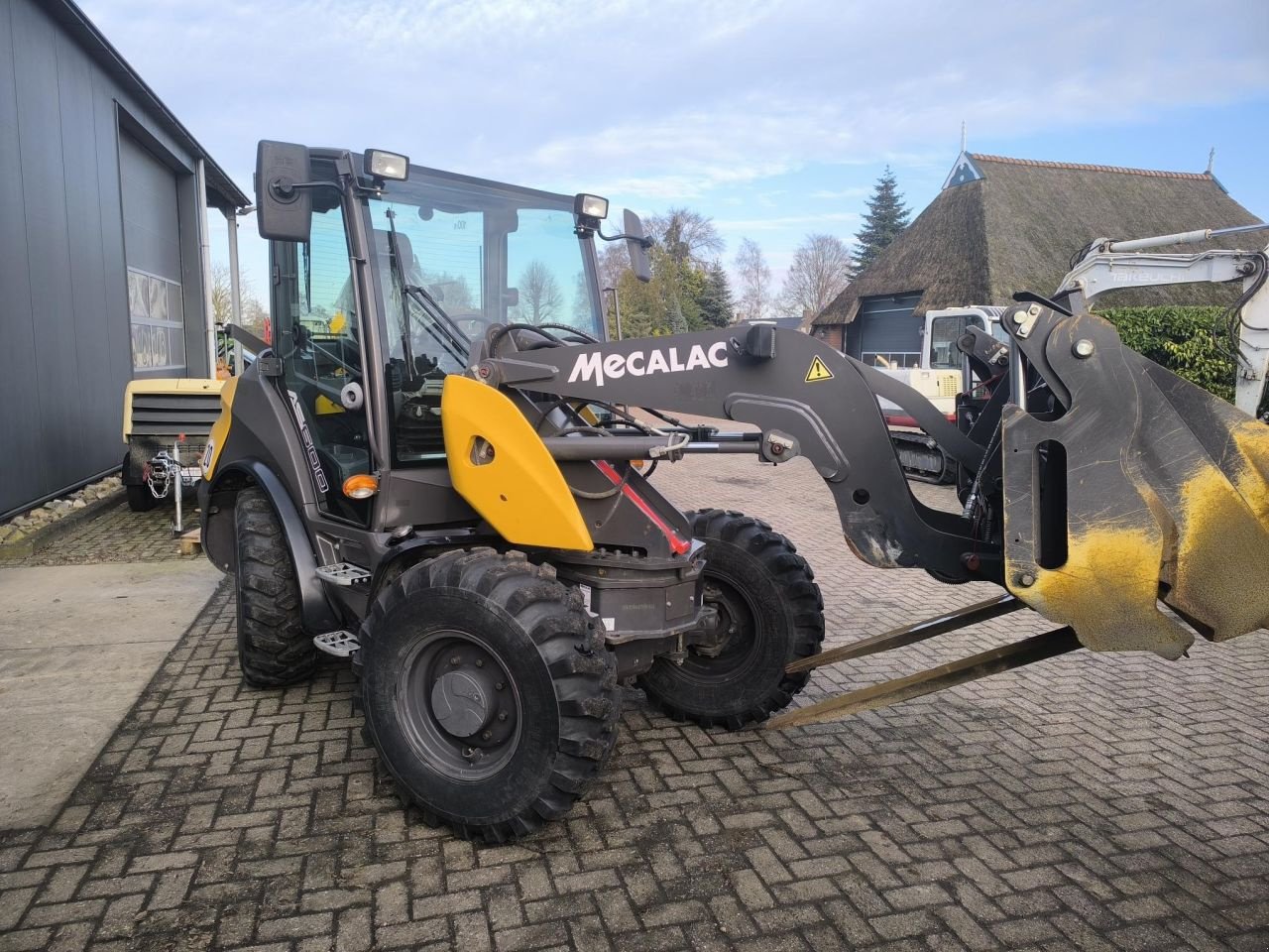 Radlader des Typs Mecalac AS600 ZWENKLADER, Gebrauchtmaschine in Hardegarijp (Bild 3)