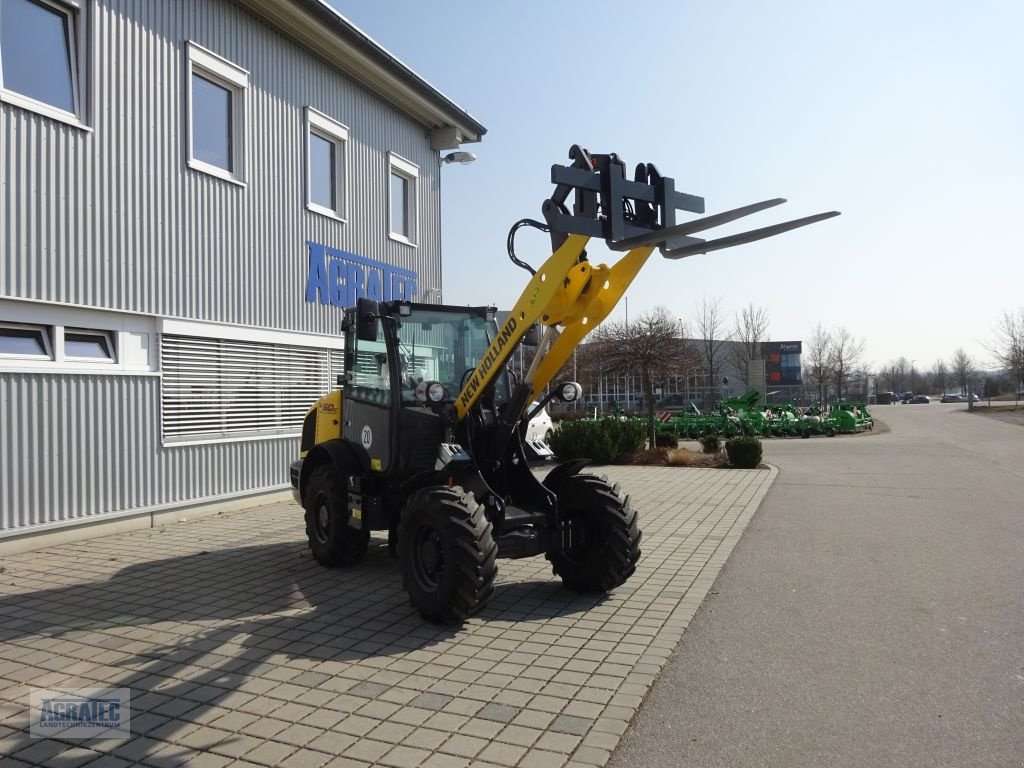 Radlader of the type New Holland W 50 C, Neumaschine in Salching bei Straubing (Picture 4)