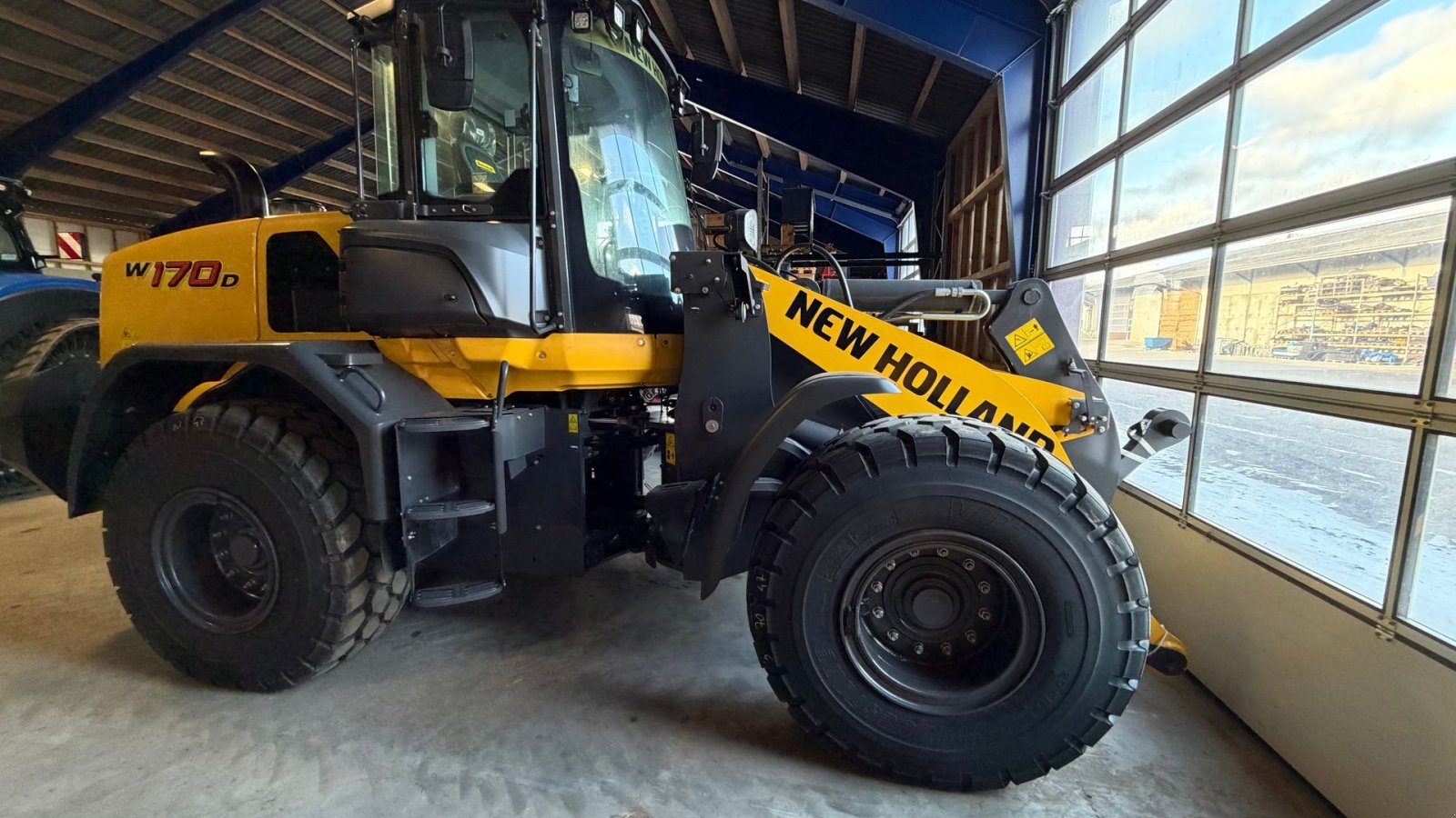 Radlader van het type New Holland W170D, Gebrauchtmaschine in Gjerlev J. (Foto 2)