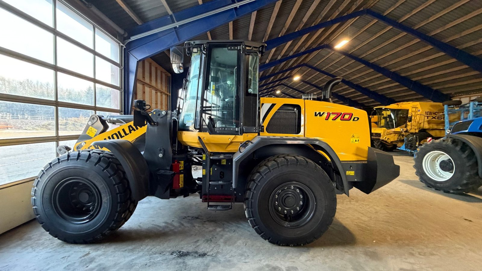 Radlader van het type New Holland W170D, Gebrauchtmaschine in Gjerlev J. (Foto 1)